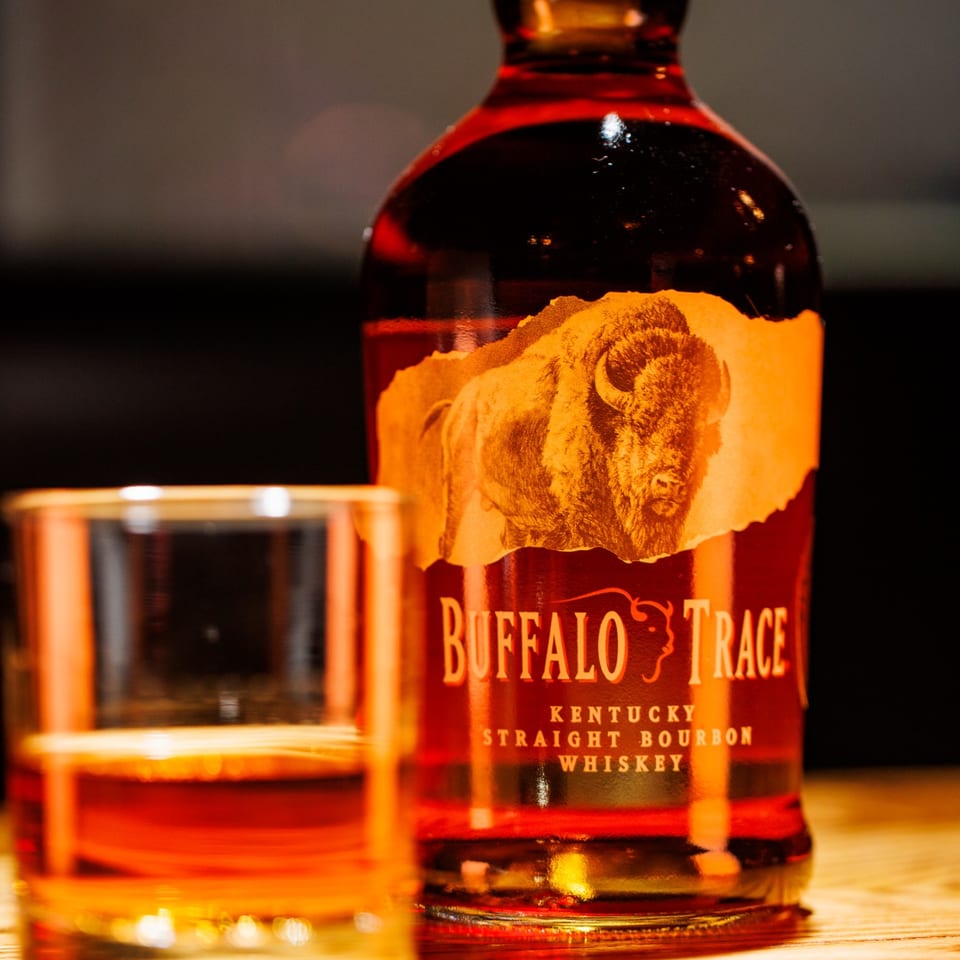 Buffalo Trace bourbon and a whiskey pour.