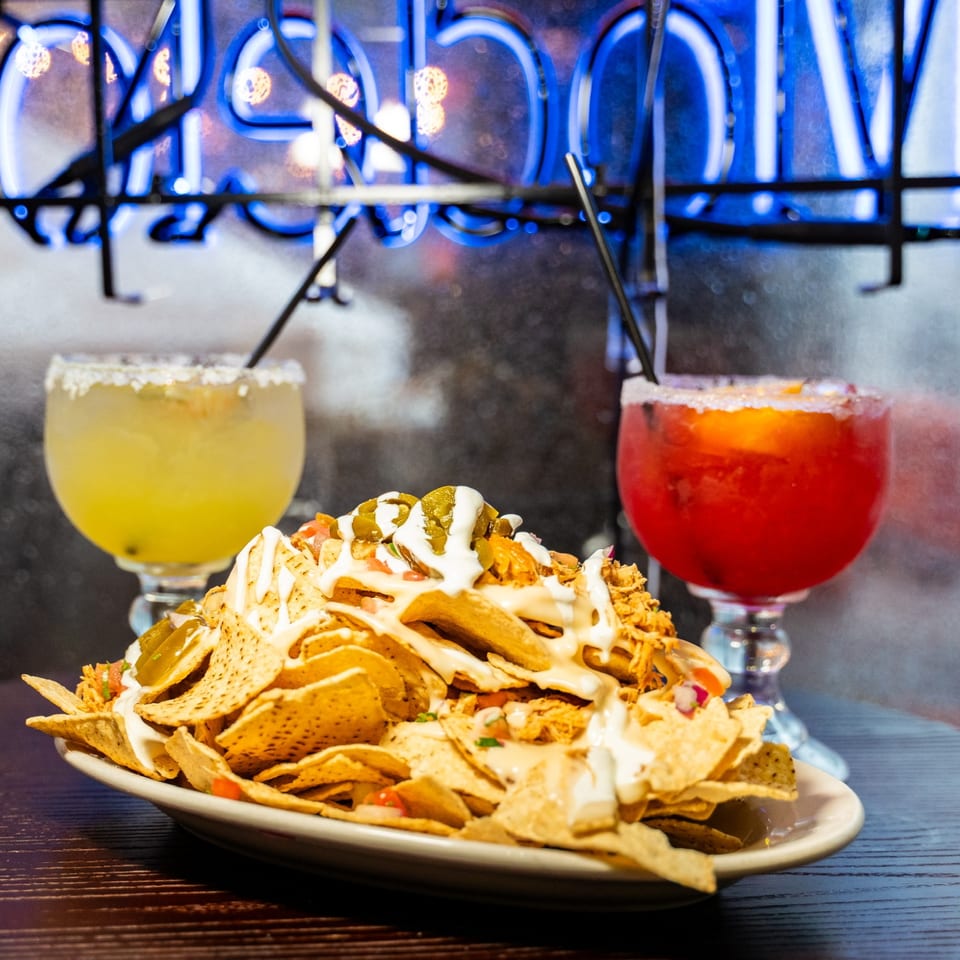 Loaded nachos with margaritas at Saloon 151.
