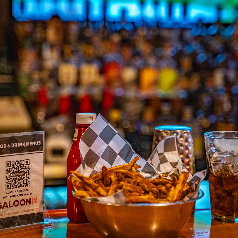 Basket of golden fries at the Saloon 151 bar.
